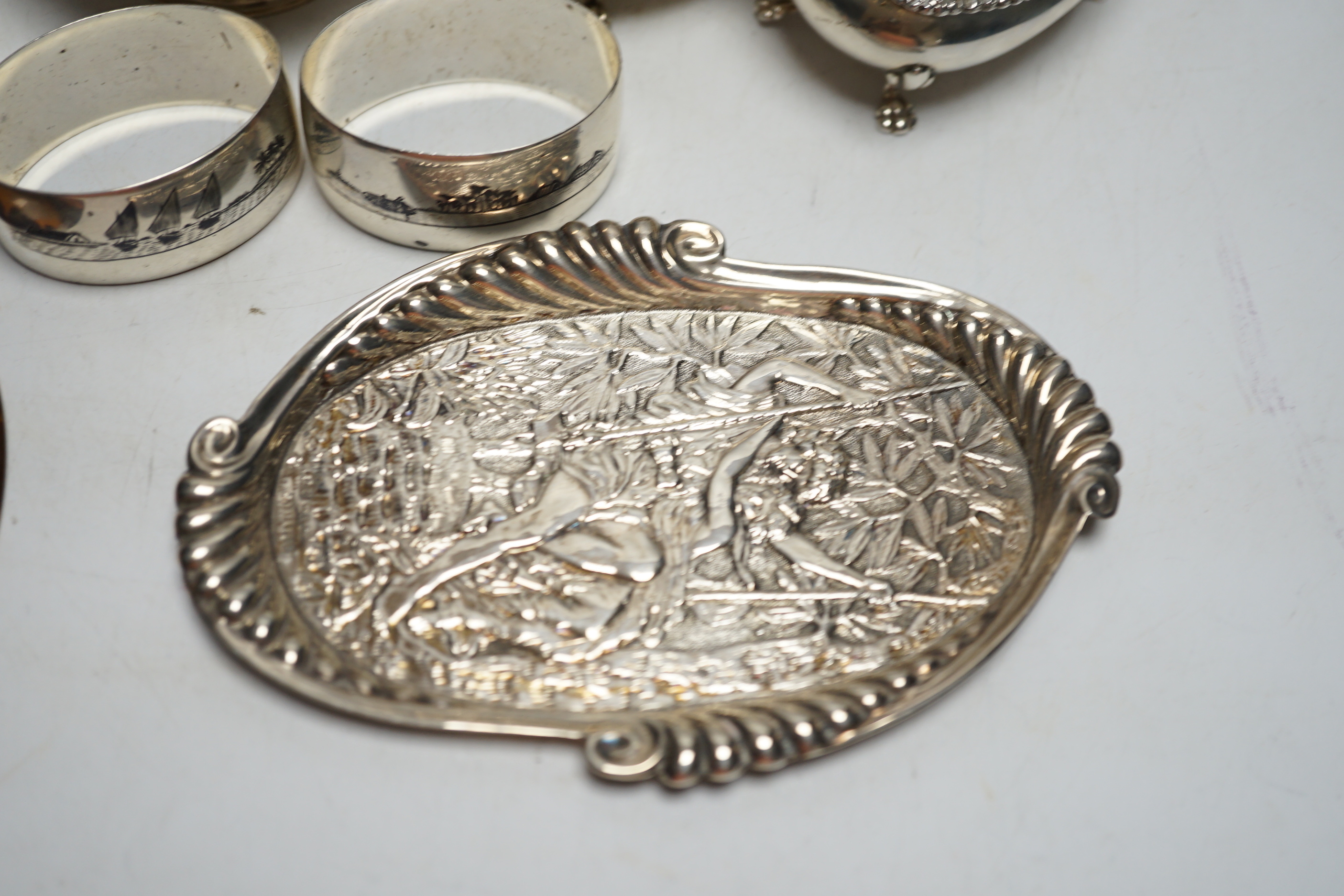 Sundry small silver etc. including an Edwardian silver tea caddy, London, 1902, 98mm, napkin rings including Persian white metal, a tortoiseshell letter clip, thimbles, condiments etc.